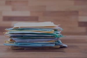 Photo of a stack of folders on a table